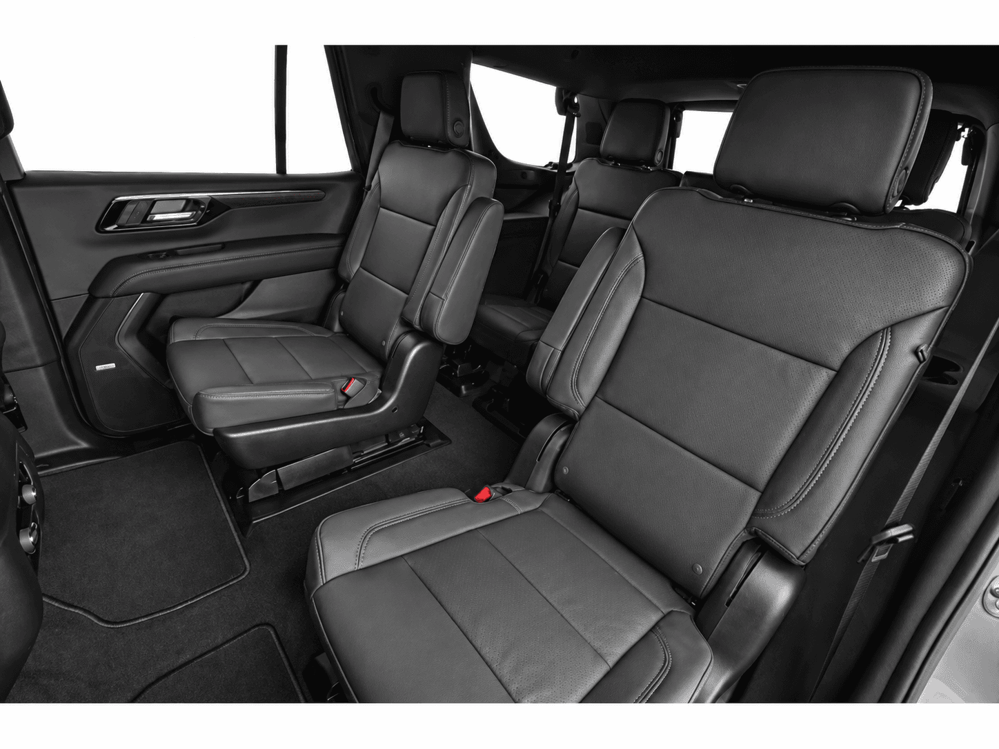 Chauffeur assisting guests at an airport transfer pickup